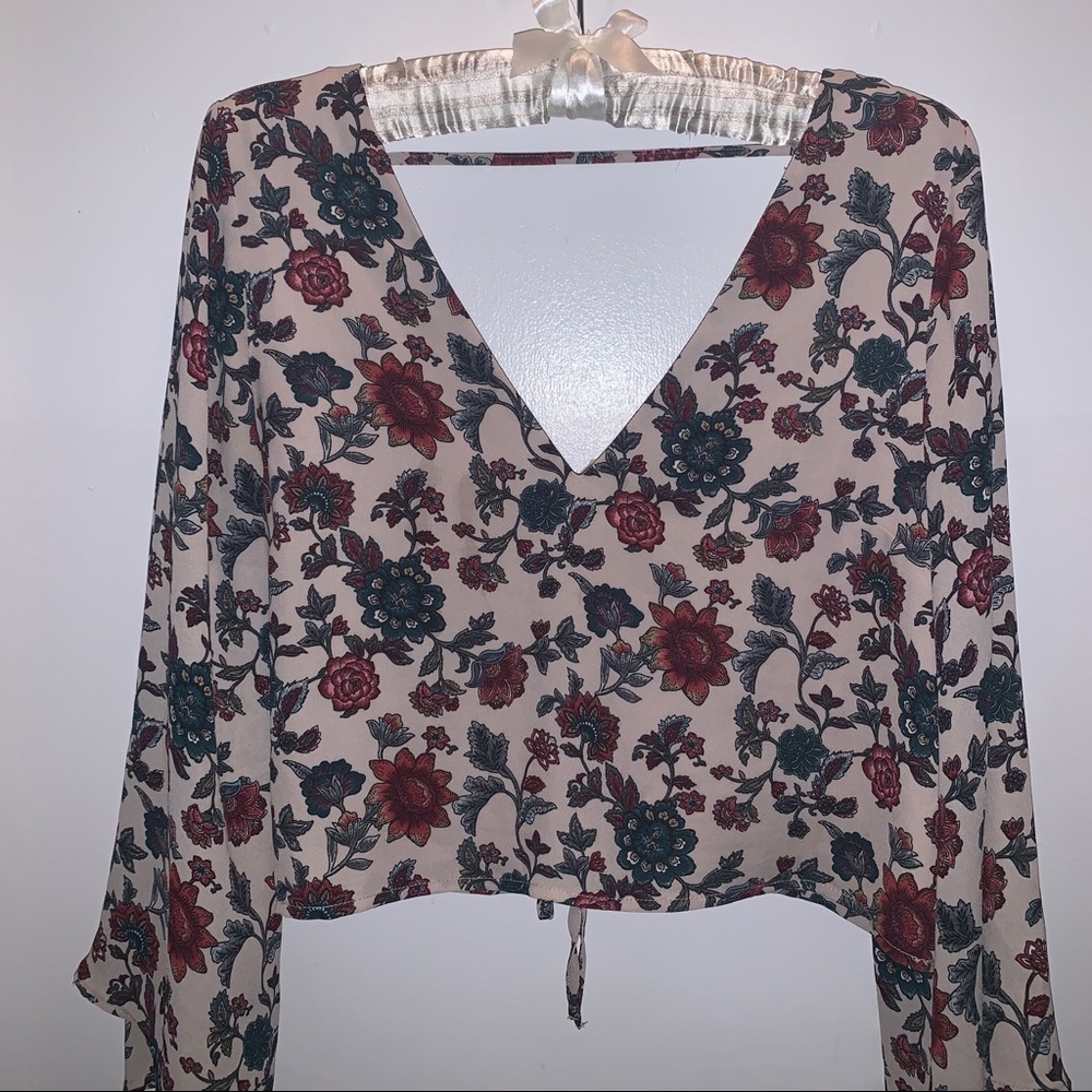 deep v floral blouse.